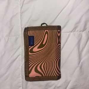 BAGGU Nylon Trifold Wallet in “Trippy Swirl Salmon”